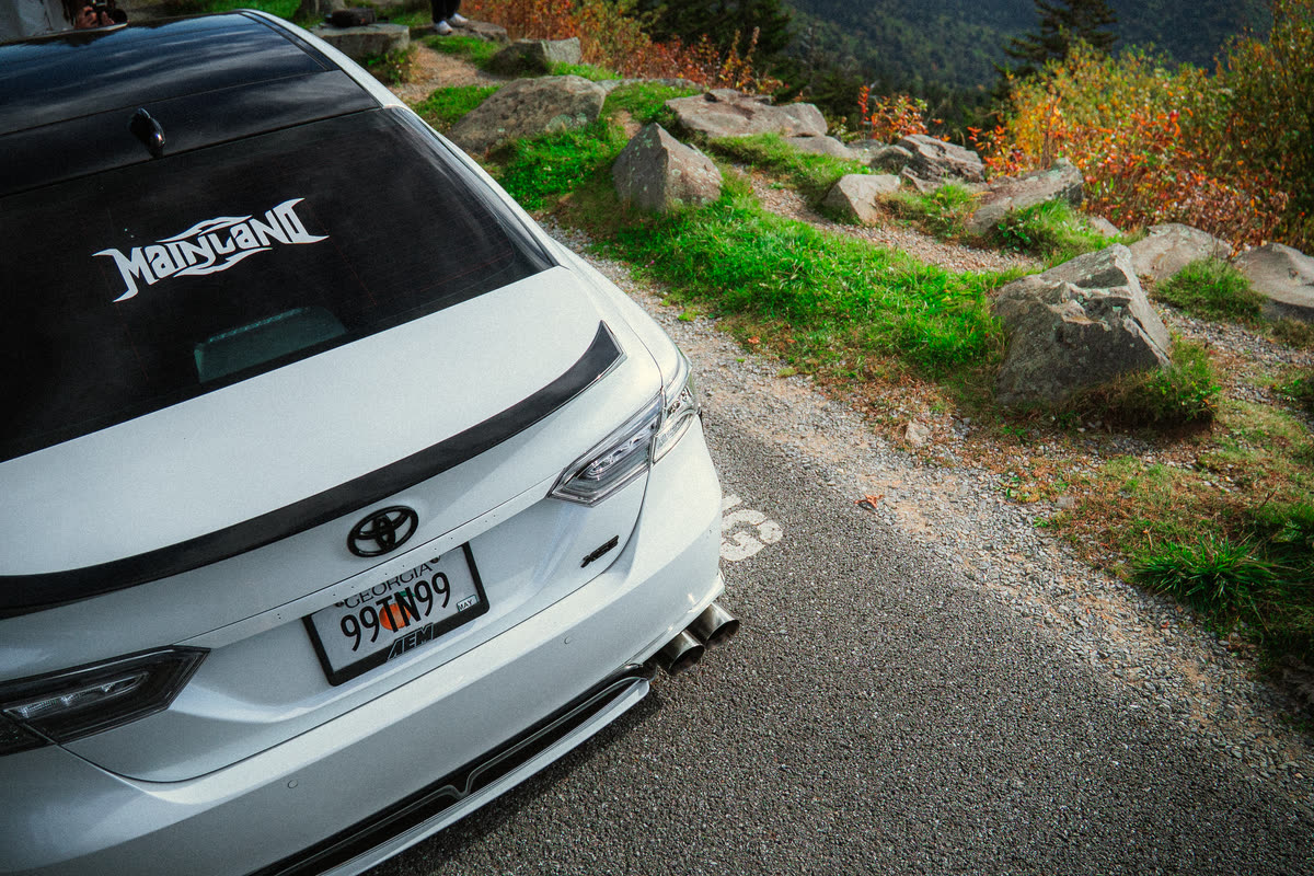 Digital still, a car on a mountain road